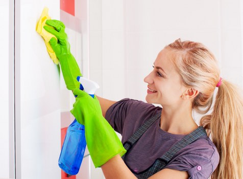 Professional sofa cleaning service in a Haringey home with a fabric couch