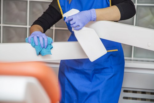 Technician training for oven cleaning with careful appliance handling